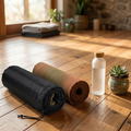 Acupressure mat rolled up in carry bag — portable yoga and wellness accessory