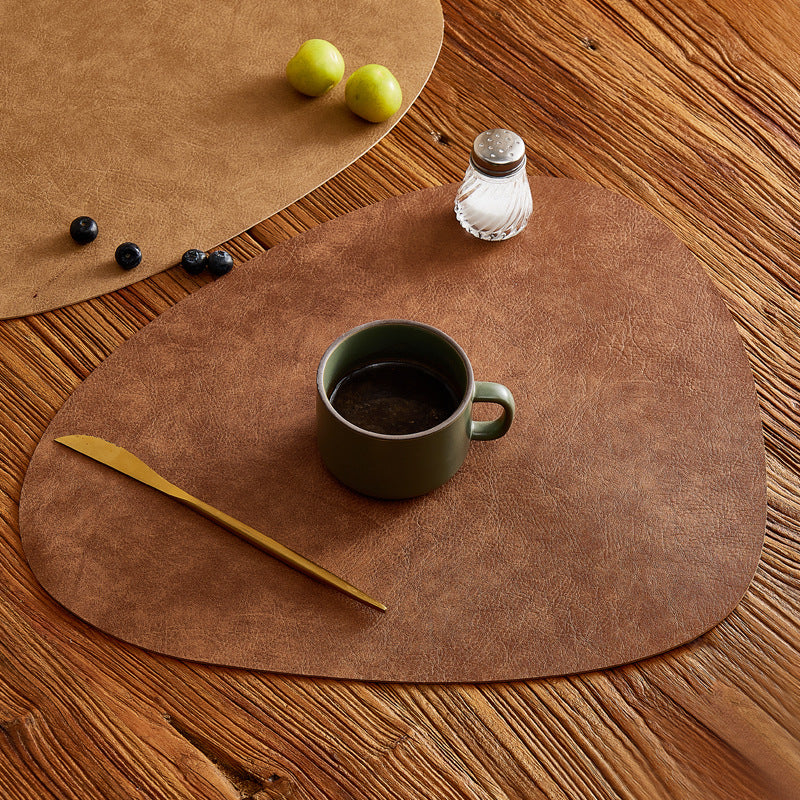 Close-up of Tuscany leather placemat texture in India Brown showing rich grain detail