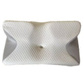 Butterfly cervical pillow with removable washable polyester cover unzipped to reveal memory foam core